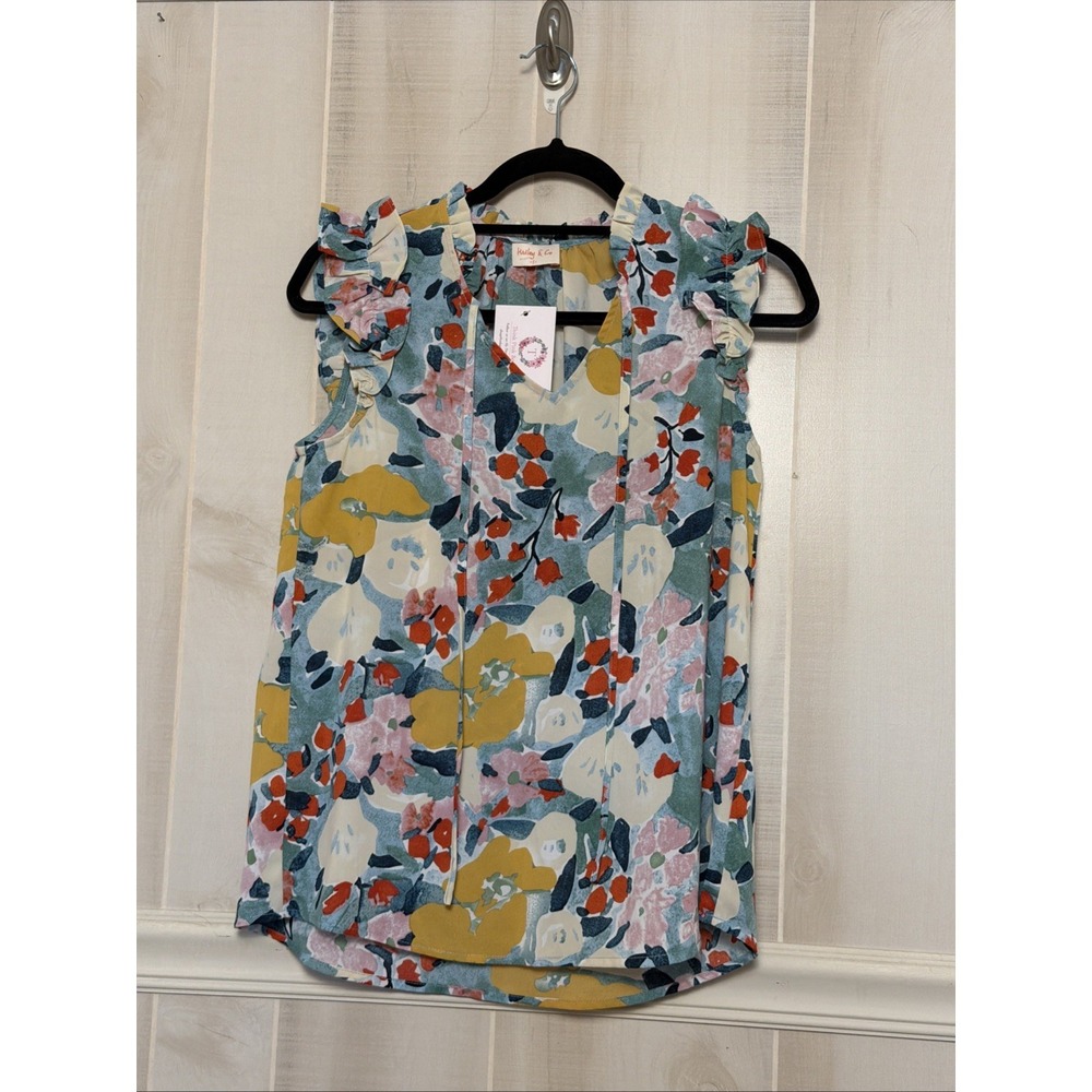 Hailey & Co Watercolor Top.  Size S  Floral Ruffle Shoulder And Neck‎ Tie Neck